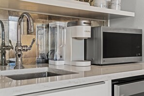 Fridge, microwave, coffee/tea maker, toaster
