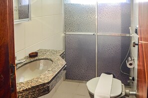 A bathroom with a granite sink, a toilet, and a shower enclosure. - 3-B Ap in Condo W/pool, 600m From the Beach Cee202 (Cabo Frio)