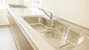 Fridge, microwave, stovetop, cookware/dishes/utensils