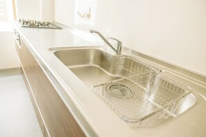 Fridge, microwave, stovetop, cookware/dishes/utensils