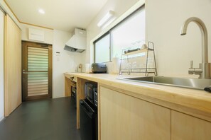 Fridge, microwave, stovetop, cookware/dishes/utensils