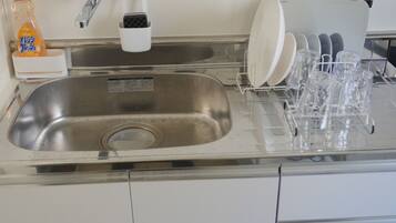 Fridge, microwave, stovetop, cookware/dishes/utensils