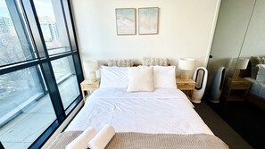 2 habitaciones, tabla de planchar con plancha, wifi y ropa de cama 