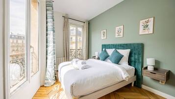 2 habitaciones, tabla de planchar con plancha, cuna de viaje y wifi