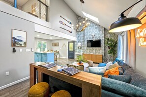TV, fireplace, books