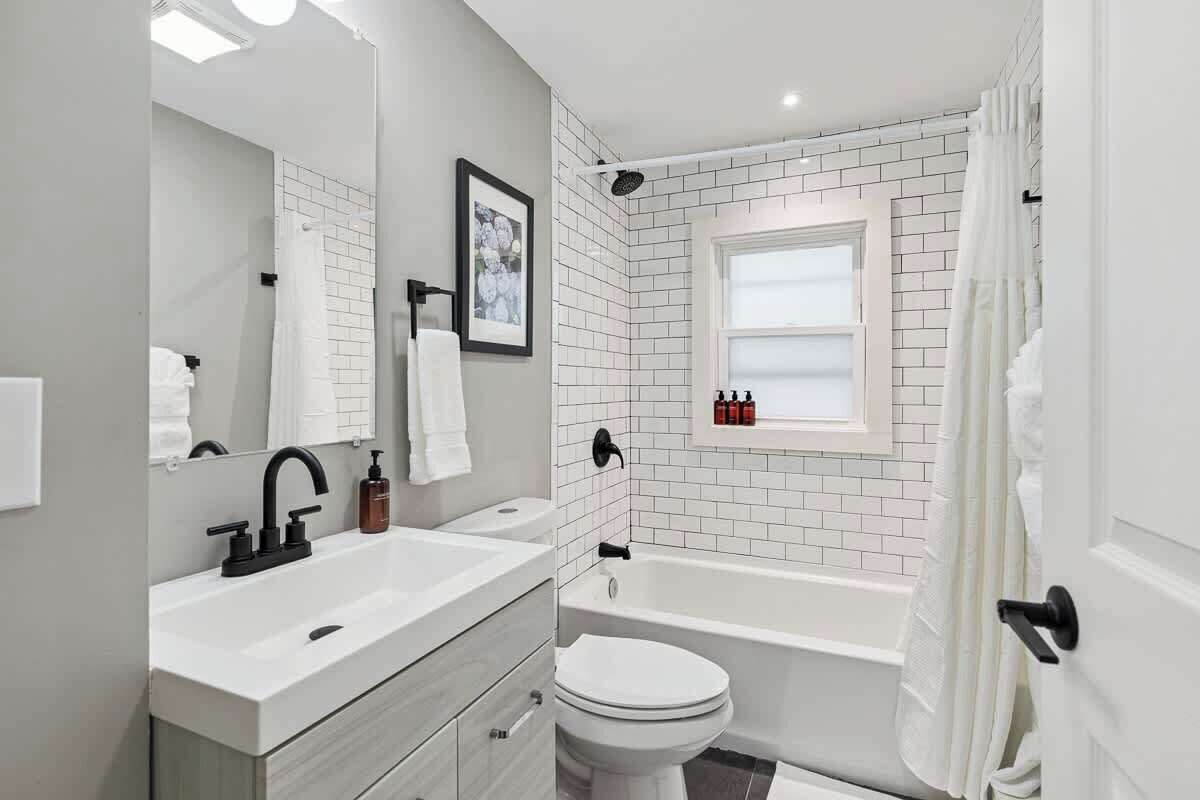 Shower, hair dryer, towels, shampoo