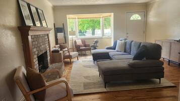 Smart TV, fireplace, foosball, books