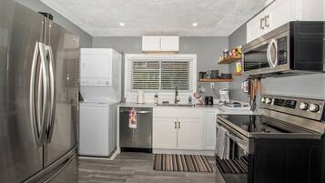 Fridge, microwave, dining tables