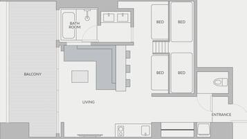 A floor plan with a balcony, living area, bathroom, and three bedrooms.