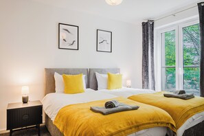 4 habitaciones, escritorio, tabla de planchar con plancha y wifi gratis 