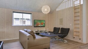 TV, fireplace, video game console, table football