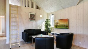 Una chimenea, un futbolín, una mesa de tenis de mesa