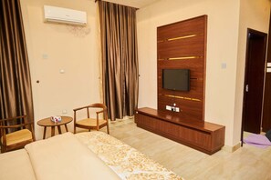 Family Apartment, Balcony, City View | Desk, laptop workspace, blackout drapes, soundproofing