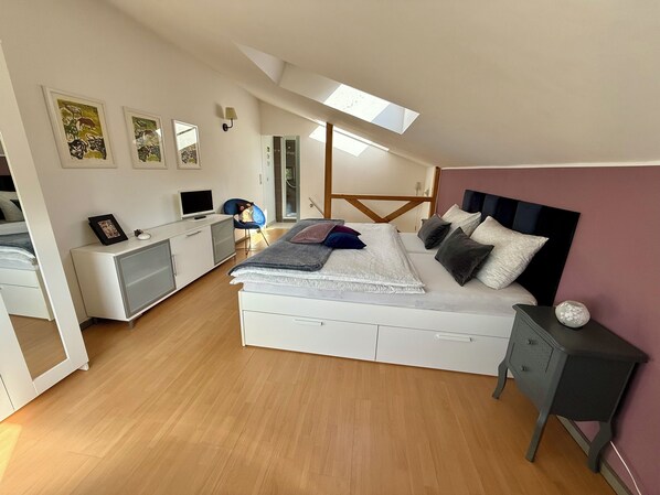 1 bedroom, desk, iron/ironing board, travel crib