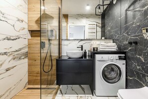 Shower, hair dryer, towels