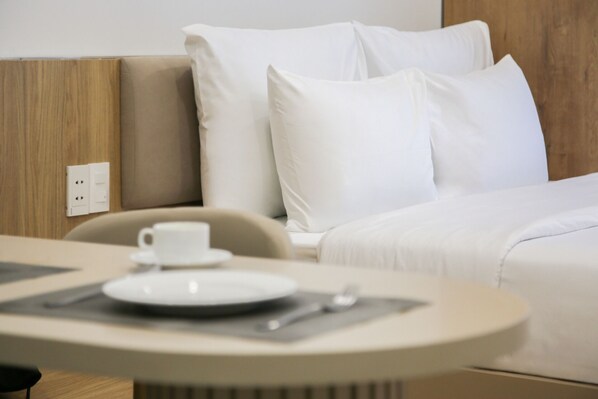 Deluxe Studio | In-room safe, desk, laptop workspace, blackout curtains