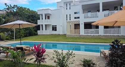 Modern 4-Bedroom Villa with Rooftop & Beach Access – Diani