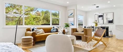 House (4 Bedrooms) | Living area | 43-inch flat-screen TV with cable channels, foosball