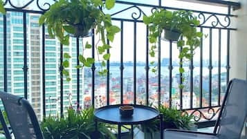 Deluxe Room, City View | Balcony