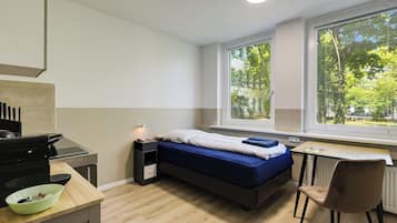 City Apartment | Coffres-forts dans les chambres, fer et planche à repasser