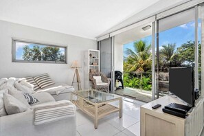 TV, offices - Beachfront Penthouse Dunk Island Views & Prime Village Location (Mission Beach)