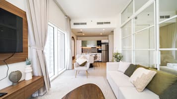 Exclusive Apartment, Balcony, City View | Living room | Smart TV