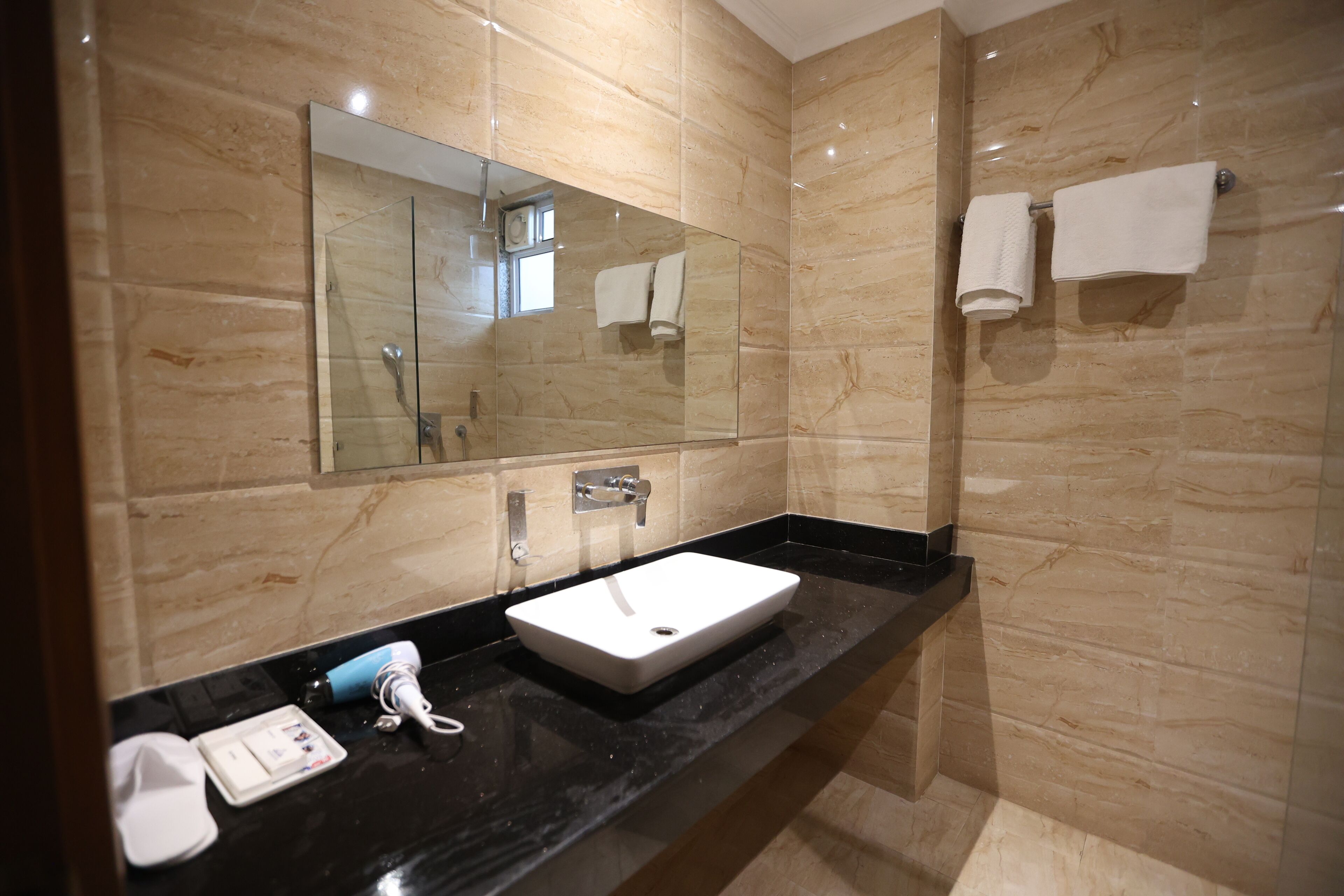 Rainfall showerhead, free toiletries, hair dryer, slippers
