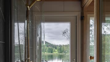 Standard Studio, 1 Queen Bed, Lake View, Lakeside | Bathroom | Shower, hair dryer, towels, toilet paper