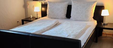 2 habitaciones, tabla de planchar con plancha, wifi y ropa de cama