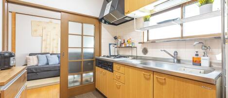 Fridge, microwave, stovetop, coffee/tea maker