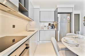 Premium Apartment, Balcony, Bay View | Private kitchen | Full-size fridge, microwave, oven, stovetop