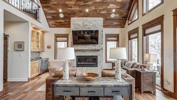 TV, fireplace, books, stereo