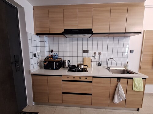 Luxury Studio at The Loftel with Proximity to two rivers & village market Malls