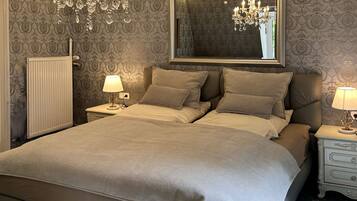 3 habitaciones, tabla de planchar con plancha, wifi y ropa de cama