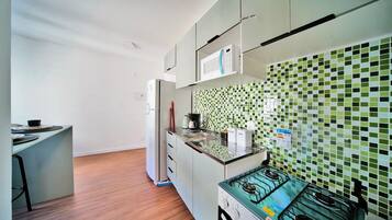 Comfort Apartment, City View | Private kitchen | Coffee/tea maker