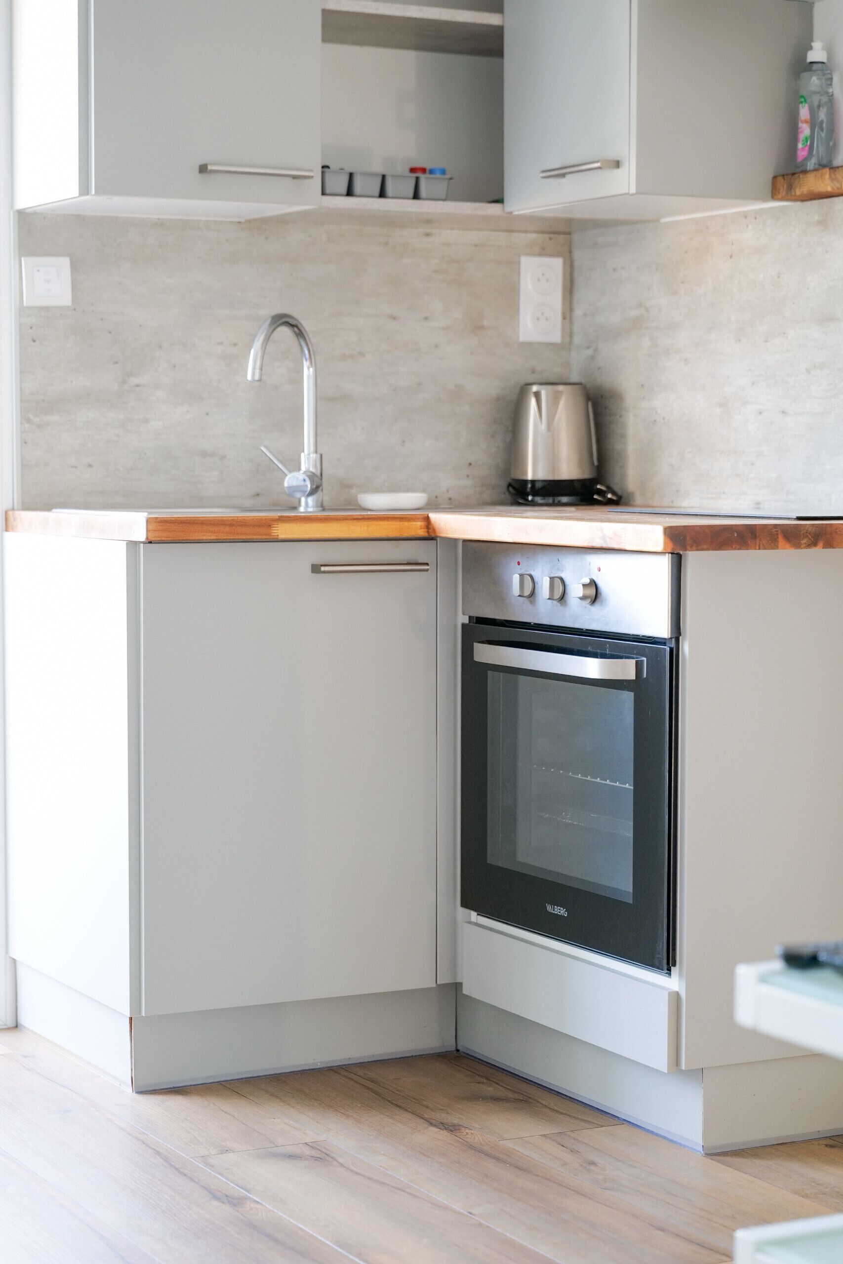 Fridge, coffee/tea maker, toaster, cookware/dishes/utensils