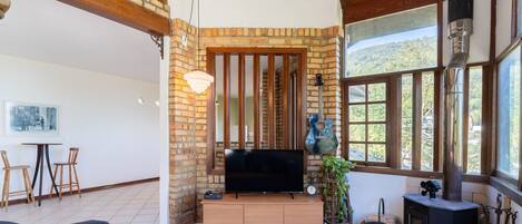 Basic Villa | Living area | 32-inch Smart TV with digital channels