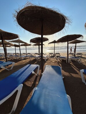 Beach nearby, sun loungers