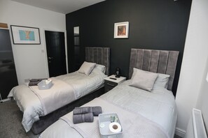 4 bedrooms, iron/ironing board, bed sheets