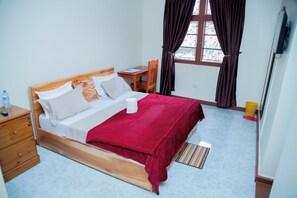 1 habitación, tabla de planchar con plancha, internet y ropa de cama 