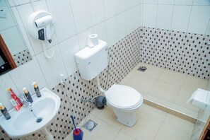 Shower, hair dryer, towels, soap