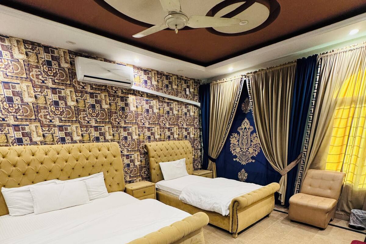 Family Room, City View | In-room safe, soundproofing, iron/ironing board, free WiFi