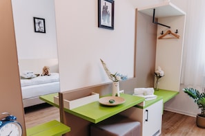 Premium bedding, desk, laptop workspace, free WiFi