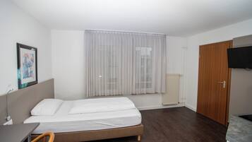 Camera singola, non fumatori, angolo cottura | Una scrivania, postazione laptop, insonorizzazione, ferro/asse da stiro