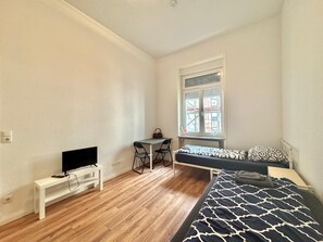Family Apartment, City View | Desk, laptop workspace, free WiFi