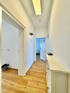 Family Apartment, City View | Desk, laptop workspace, free WiFi