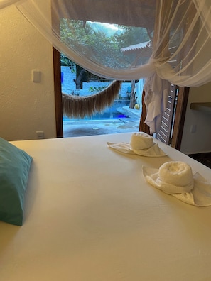 Comfort Triple Room, Pool View | Desk, laptop workspace, soundproofing, free WiFi