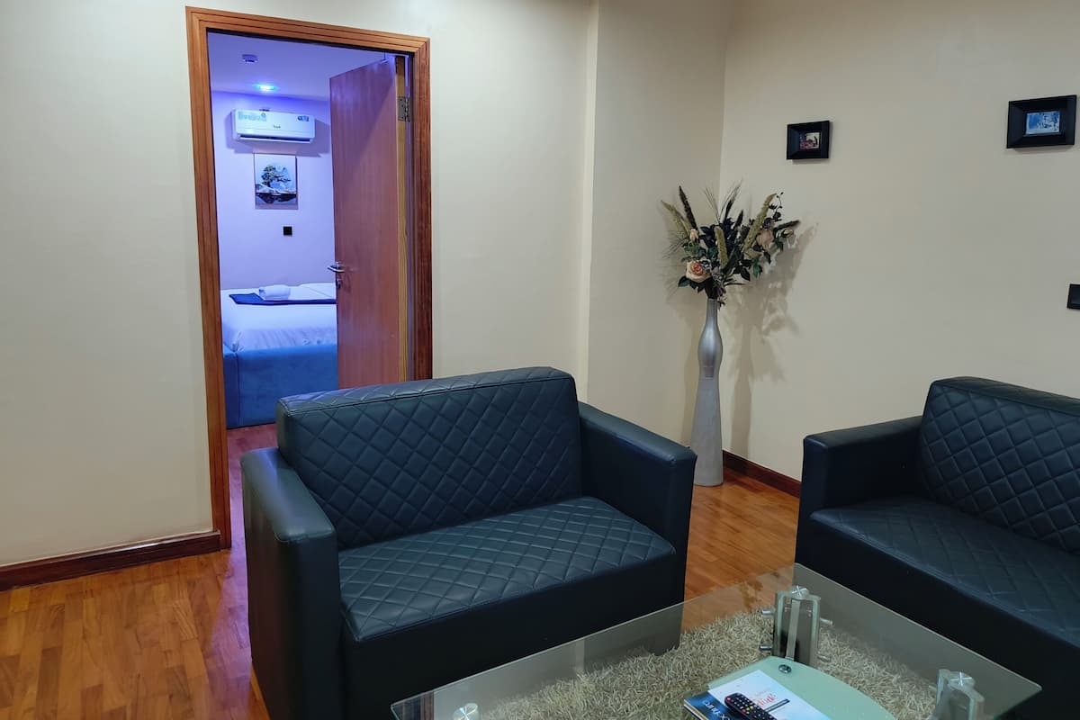 Suite – superior, utsikt mot bukt | Oppholdsområde