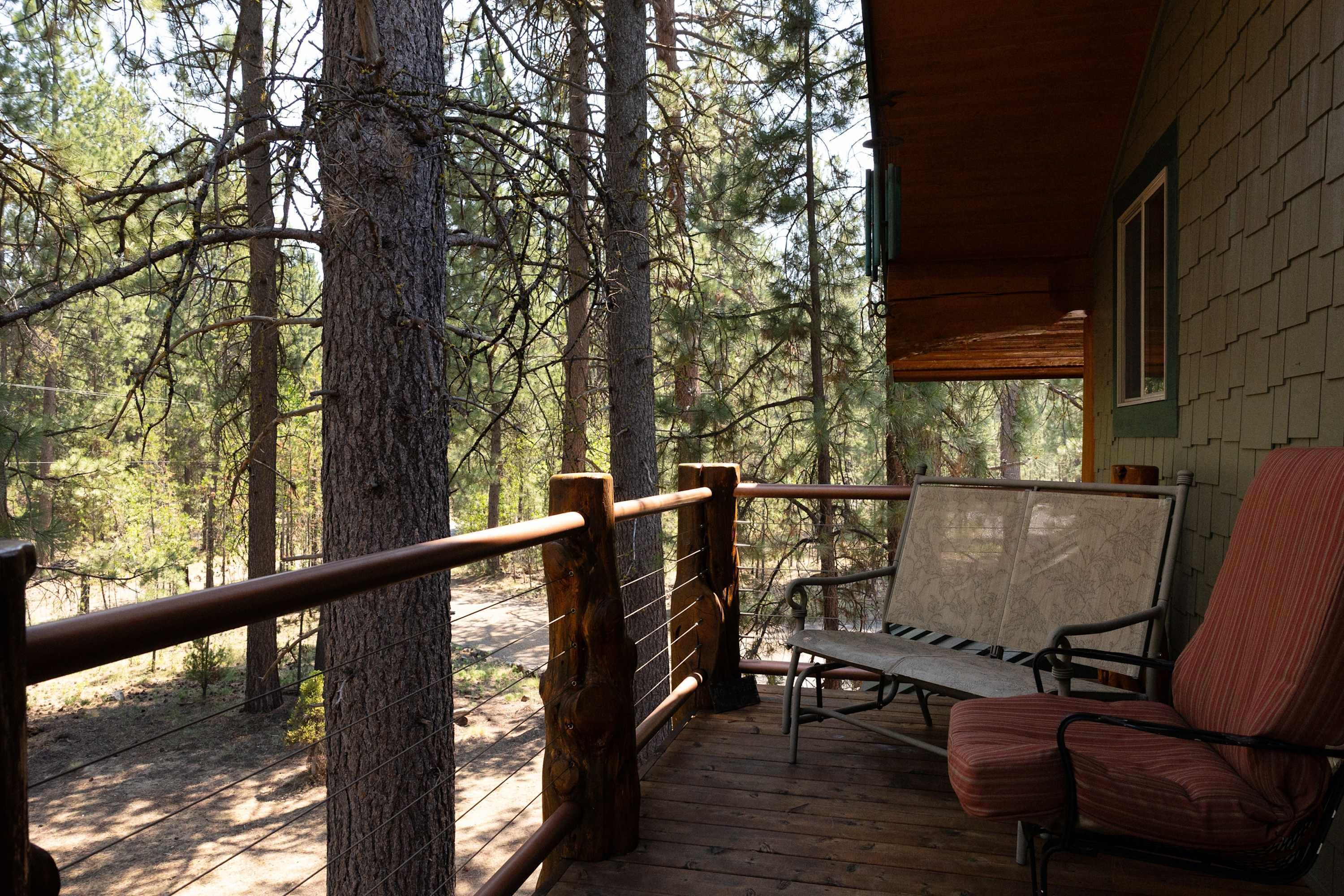 Cabaña, varias camas, patio (Grand Wildlife Lodge) | Vista desde la habitación