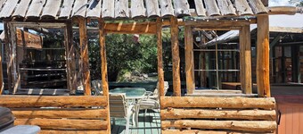 Where the Creek Giggles and the Pillows Hug Back. King Bed with Full Kitchen.